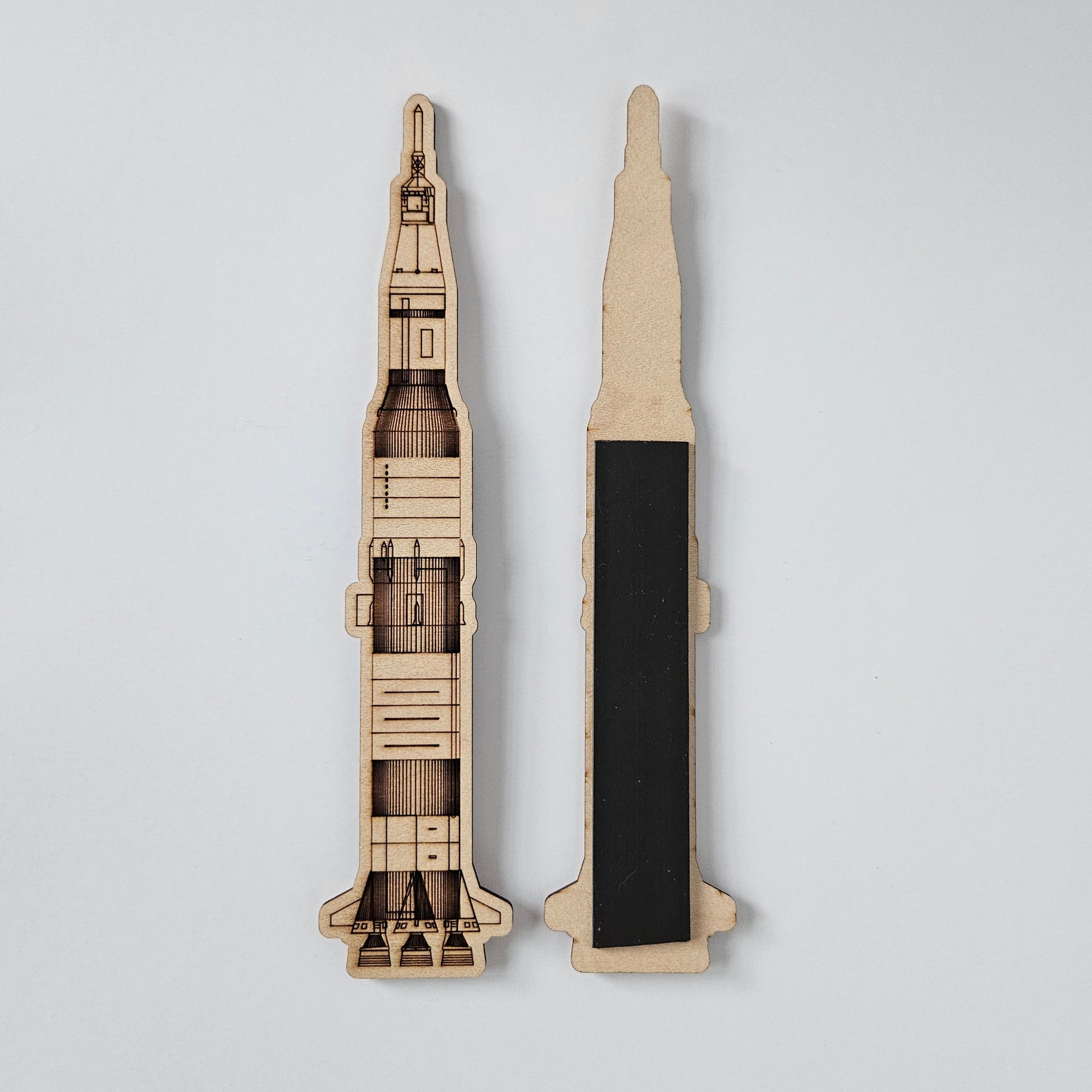 Rocket magnet, 7 inches long with detailed laser engraving made to look like the Saturn V rocket.