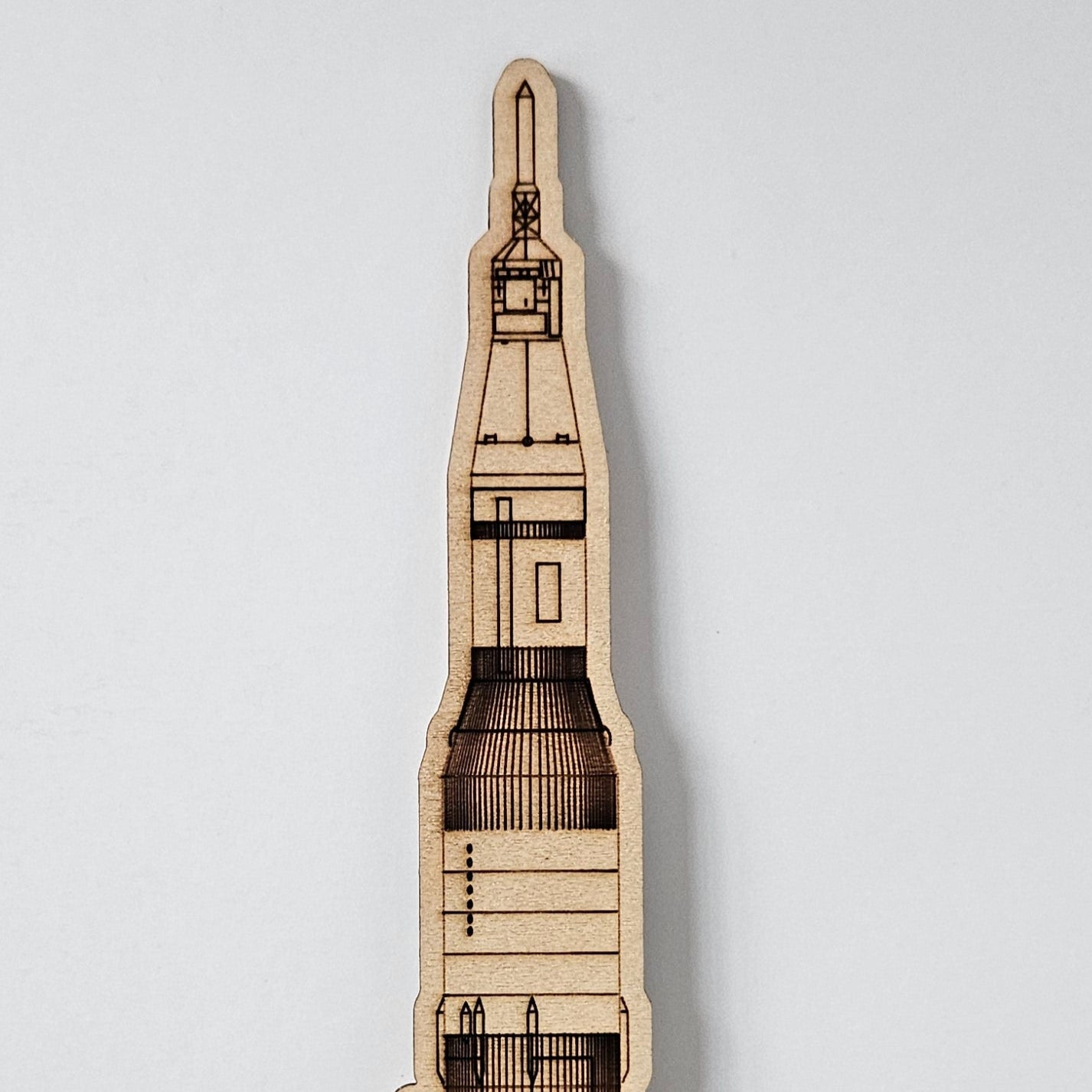 Close-up of the top-half of the rocket showing the etching detail.