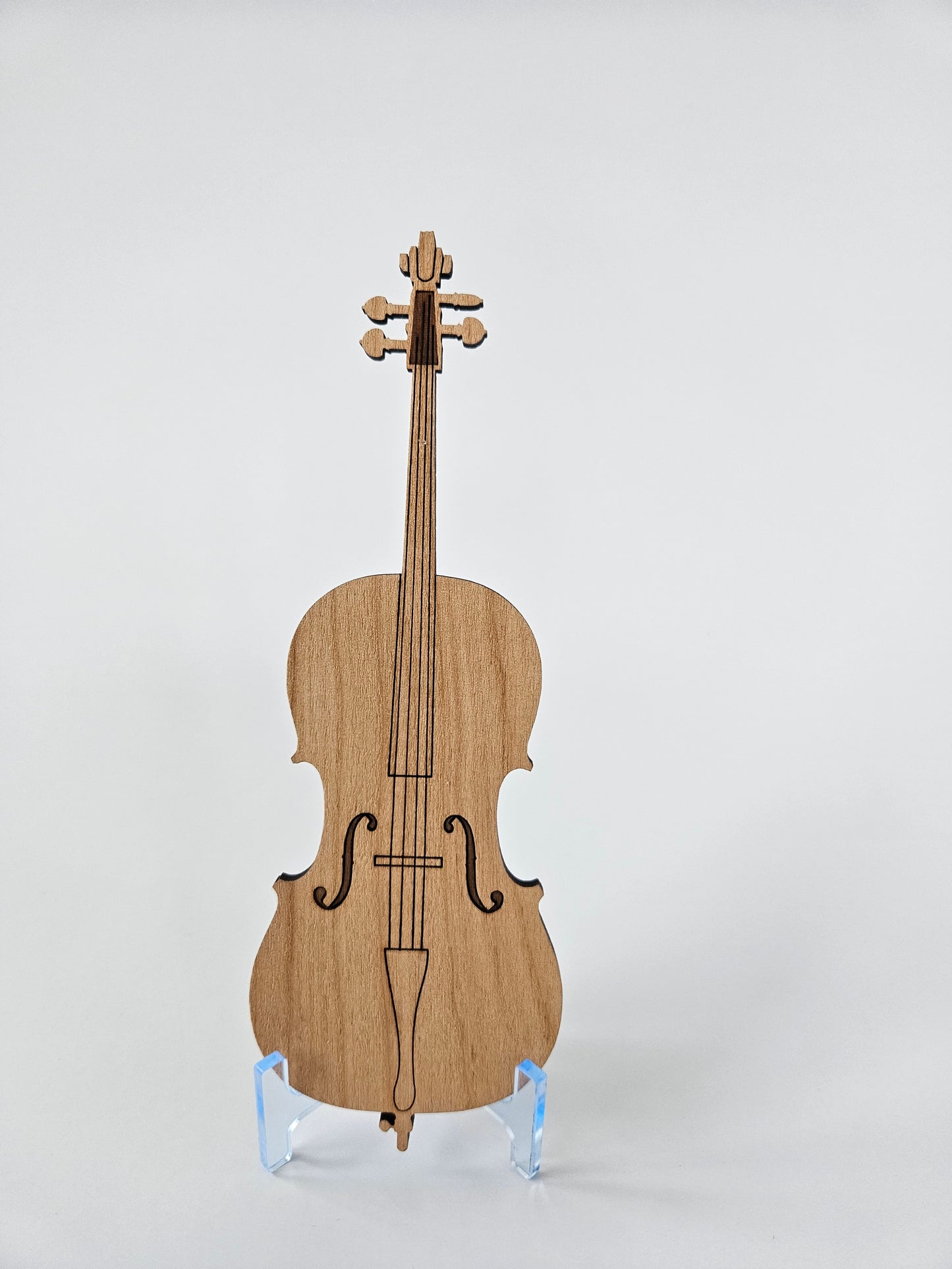 Wooden cello model on a white background